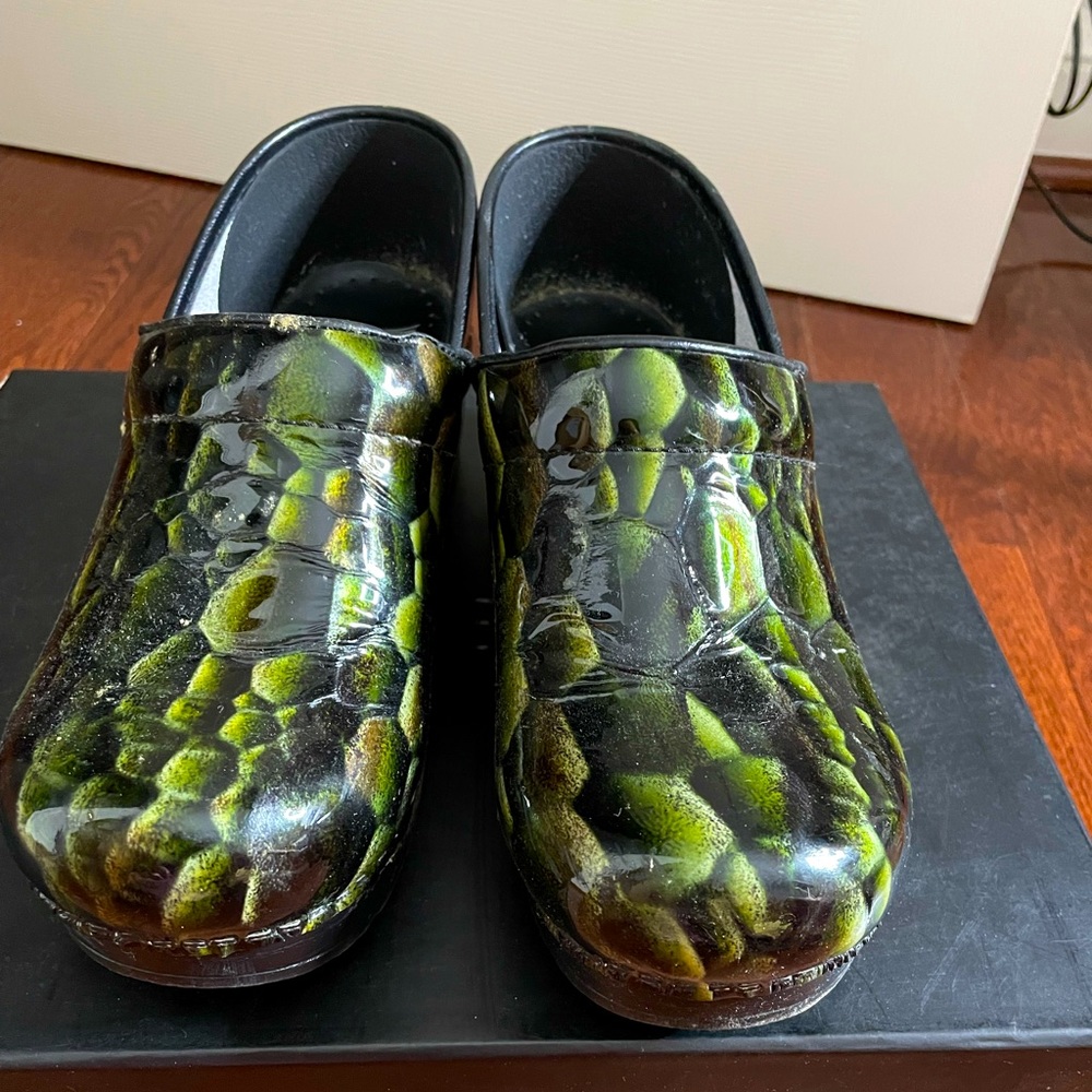 Like new Dansko reptile print clogs